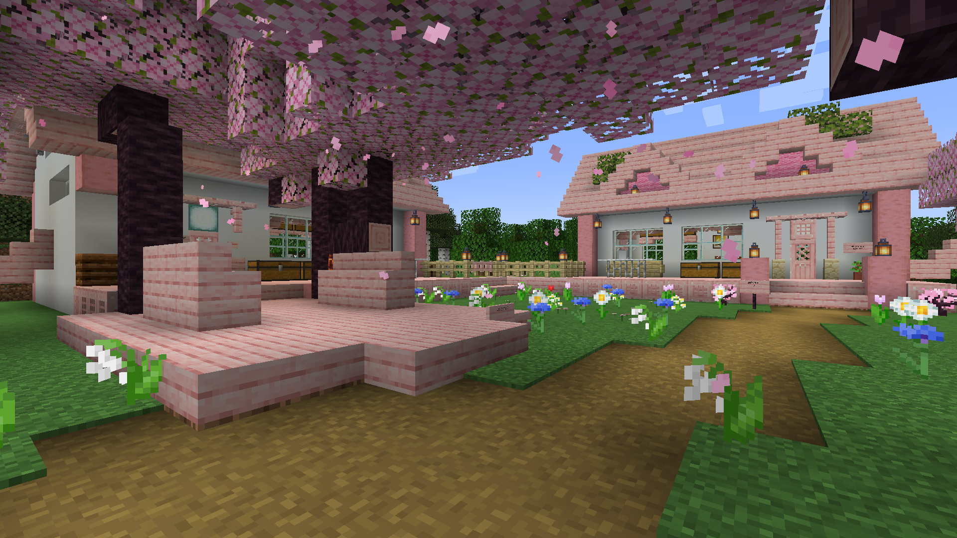 Two pink/cherry blossom tree themed houses built by Taylor.